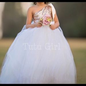 Flower girl dress rose gold top off white bottom.